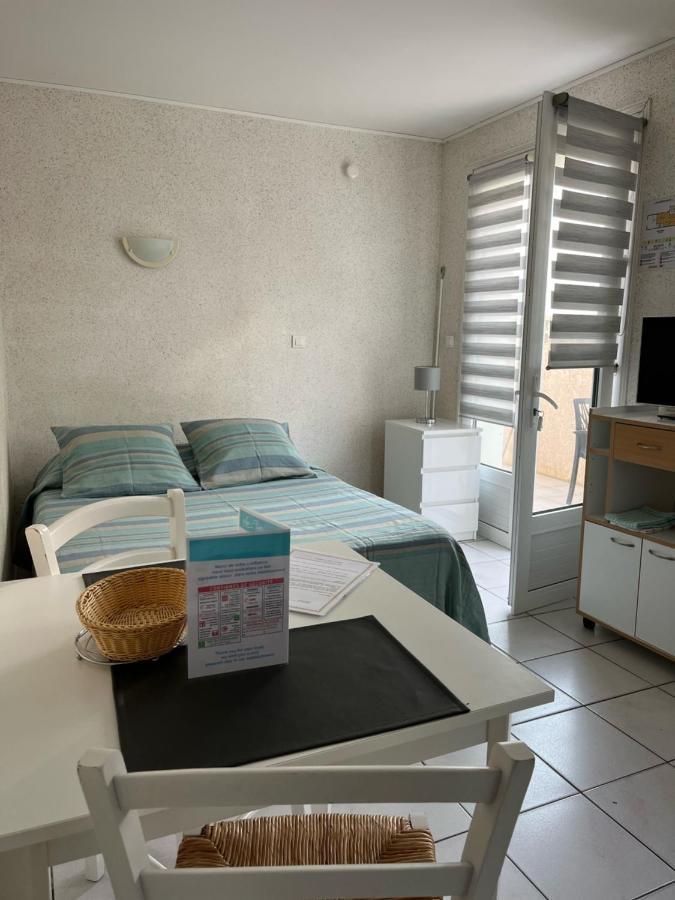 Hôtel Résidence Les Flots Saint-Palais-sur-Mer Esterno foto